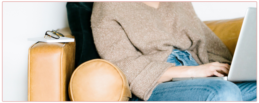 Woman's purse spilled out on desk - for 5 mistakes business owners make when setting goals blog post