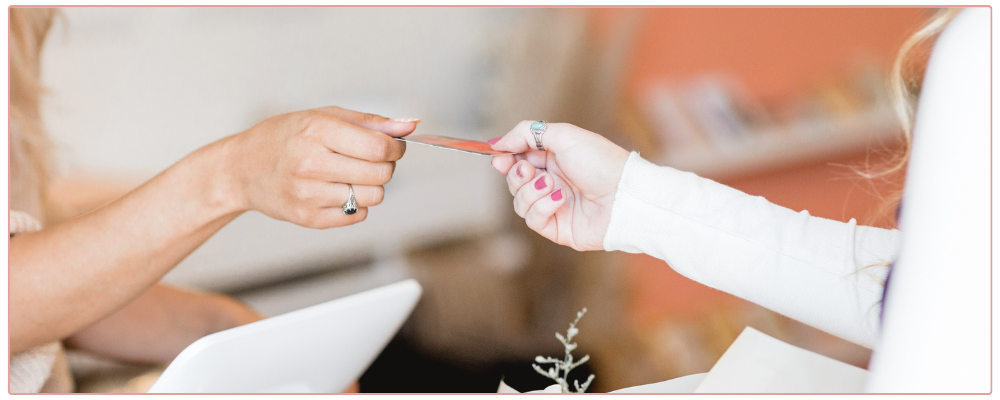 Woman stretching, wearing sage coloured yoga gears with sage water bottle for blog post 4 niching myths debunked